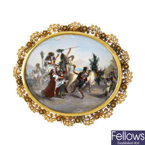 An early 20th century gold miniature portrait brooch. 