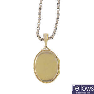 An Edwardian 9ct gold locket, with chain.