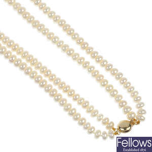Four freshwater cultured pearl two-row necklaces.