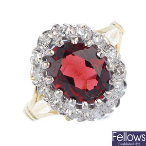 A 18ct gold garnet and diamond cluster ring.