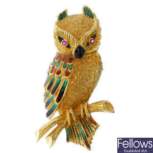 An enamel and ruby owl brooch.