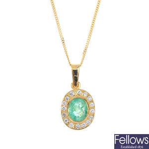 An 18ct gold emerald and diamond cluster pendant. 