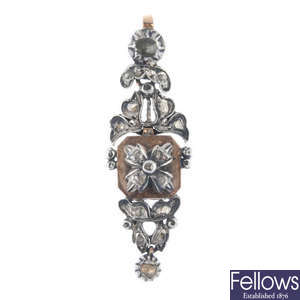 A late 19th century silver and 9ct gold diamond pendant. 