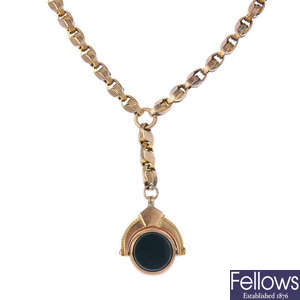 A late 19th century 9ct gold Albert chain and hardstone swivel fob. 