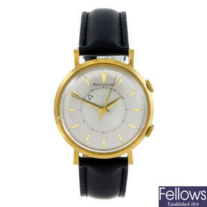 JAEGER-LECOULTRE - a gentleman's yellow metal Memo-Vox wrist watch.
