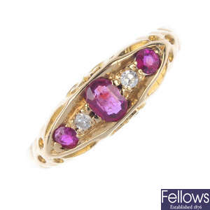 An early 20th century 18ct gold ruby and diamond five-stone ring. 