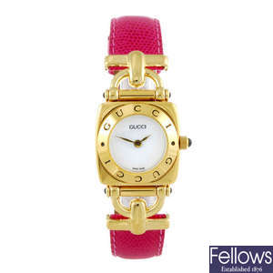 GUCCI - a lady's gold plated 6300L wrist watch.