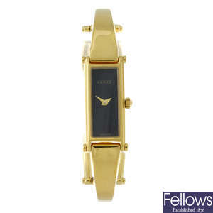 GUCCI - a lady's gold plated 1500 bracelet watch.