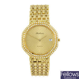 BASKANIA - a gentleman's factory diamond set yellow metal bracelet watch.