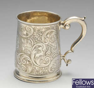 A George II silver mug.