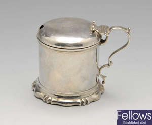 A Victorian silver mustard pot.