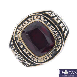 A synthetic ruby college ring.