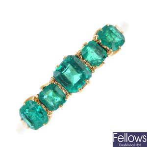 An emerald five-stone ring.