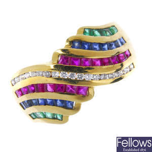 A diamond, ruby, sapphire and emerald dress ring.