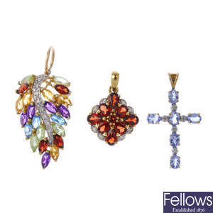 A selection of diamond and gem-set pendants.