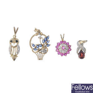 A selection of nine diamond and gem-set pendants.