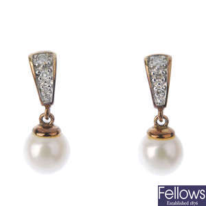 A selection of five pairs of diamond earrings.