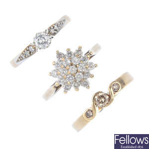 A selection of three 9ct gold diamond rings.