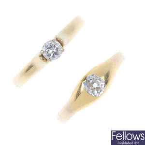Two diamond single-stone rings.