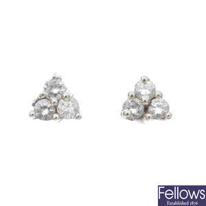 Two pairs of 18ct gold diamond ear studs and a diamond pendant.