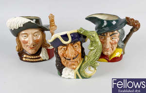 A group of four large and five small Royal Doulton character jugs, plus a Beswick ditto (10)