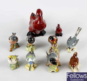 Doulton flambe duck and duckling and group of Beswick birds plus eggs