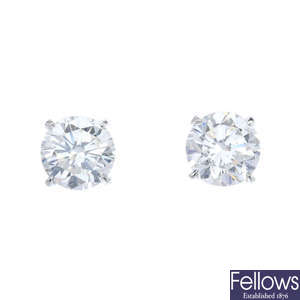 A pair of diamond brilliant-cut diamond ear studs.