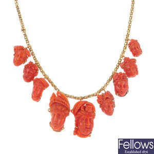 A carved coral necklace.