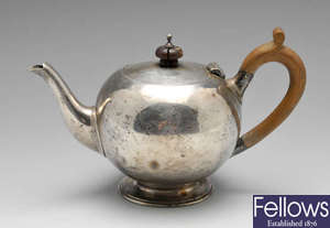 A late Victorian silver teapot, plus a selection of silver plated items.