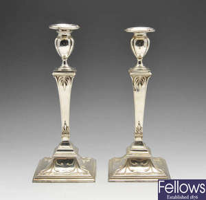 A matched pair of early 20th century Scottish silver candlesticks.