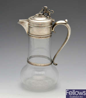 A late Victorian silver mouted glass claret jug.