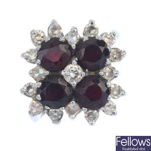 A garnet and diamond cluster ring.