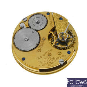 A mixed assortment of watch movements and pocket watch parts.