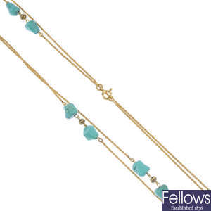 A turquoise necklace. 