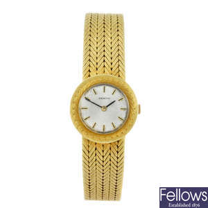 ZENITH - a lady's yellow metal bracelet watch.