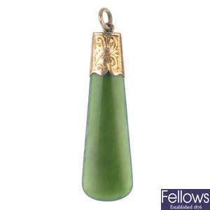 A nephrite pendant and French jet earrings.
