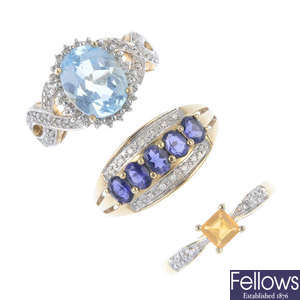 A selection of three 9ct gold diamond and gem-set rings.
