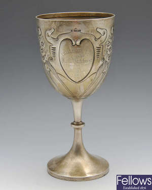 An Edwardian silver trophy cup. 
