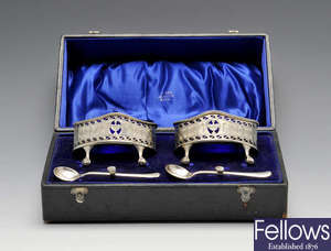 A cased pair of Edwardian silver open salts.