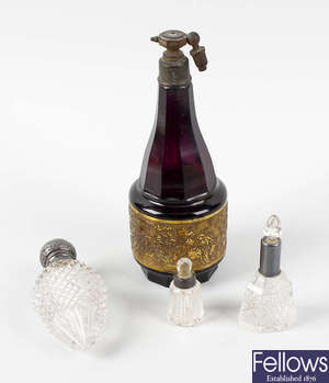 A selection of cut glass scent bottles