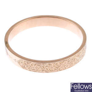 An early 20th century 9ct gold engraved slave bangle, by Smith & Pepper.