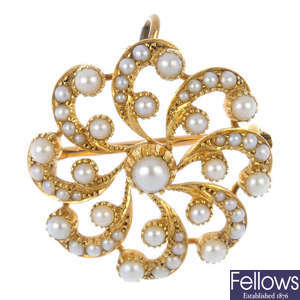 An early 20th century gold split pearl pendant.