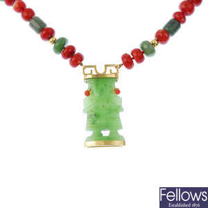 A nephrite jade and coral necklace.