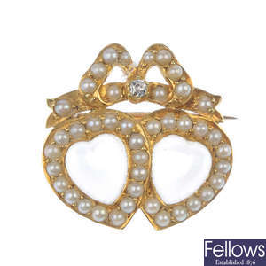 A late 19th century 15ct gold moonstone and split pearl brooch.