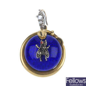 A mid 19th century gold diamond and enamel pendant.