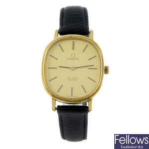 OMEGA - a gentleman's gold plated De Ville wrist watch with two gentleman's Omega watches.