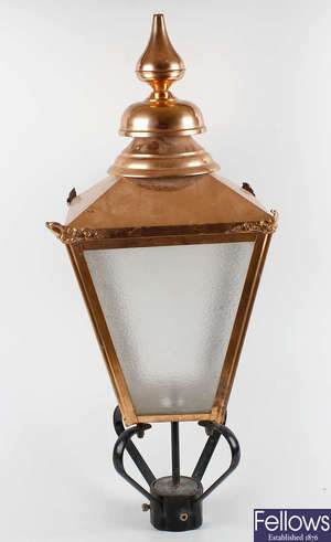 A reproduction copper lantern.