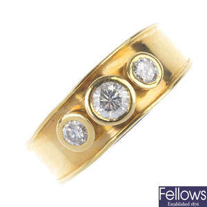 An 18ct gold diamond three-stone ring. 