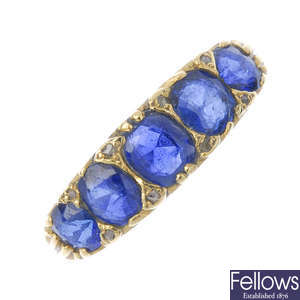 A sapphire and diamond five-stone ring.