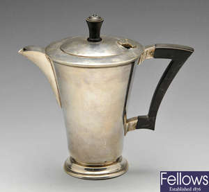 A 1940's silver hot water pot. 